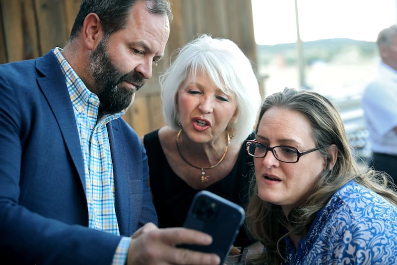 Mesa County Clerk and Colorado Republican candidate for secretary of state Tina Peters, centre, follows election results with supporters. AFP