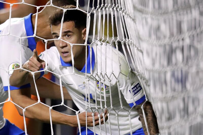 Brazil's Philippe Coutinho celebrates scoring their second goal. Reuters