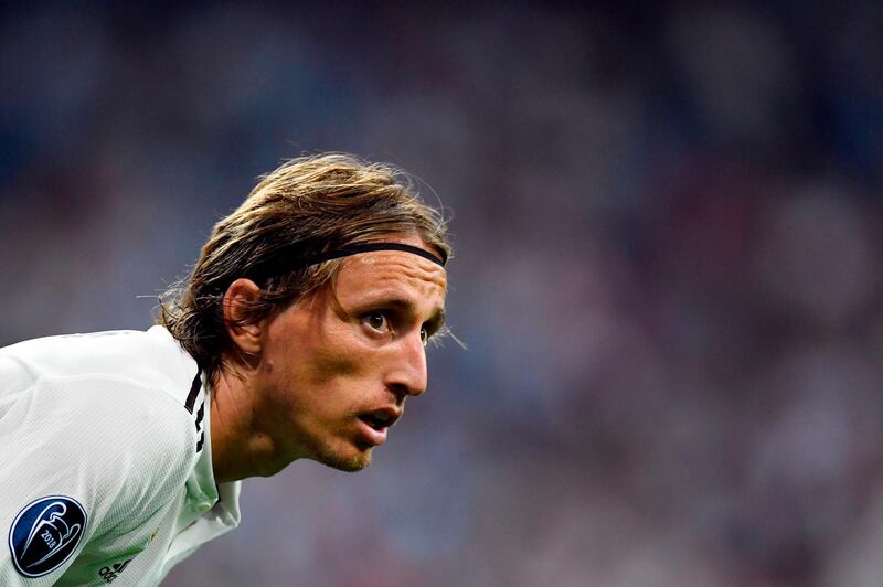 Real Madrid's Croatian midfielder Luka Modric looks on during the UEFA Champions League group G football match between Real Madrid CF and AS Roma at the Santiago Bernabeu stadium in Madrid on September 19, 2018. / AFP / GABRIEL BOUYS                    
