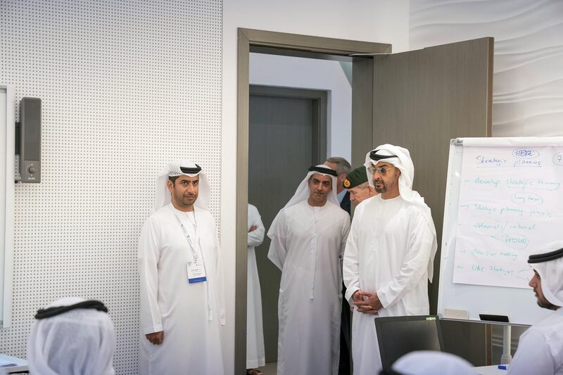 ABU DHABI, UNITED ARAB EMIRATES - September 20, 2017: HH Sheikh Mohamed bin Zayed Al Nahyan Crown Prince of Abu Dhabi Deputy Supreme Commander of the UAE Armed Forces (R), tours the Rabdan Academy during the inauguration. Seen with HH Lt General Sheikh Saif bin Zayed Al Nahyan, UAE Deputy Prime Minister and Minister of Interior (2nd R).

( Mohamed Al Hammadi / Crown Prince Court - Abu Dhabi )
---