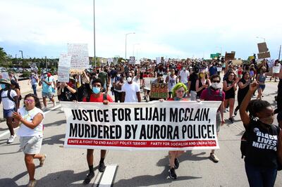 Demonstrators march on Interstate 225, shutting down a main highway in the Denver metro area, in protest against the death of Elijah McClain and police injustice in Aurora, Colorado, U.S., June 27, 2020.  REUTERS/Kevin Mohatt