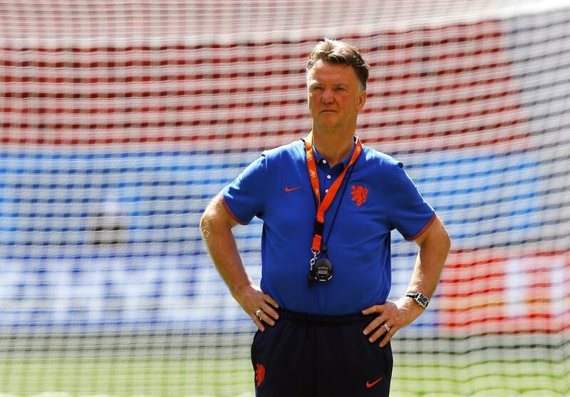 Dutch national soccer team head coach Louis Van Gaal supervises his players during their training session at Estadio National in Brasilia, Brazil on July 11, 2014. EPA/ROBERT GHEMENT