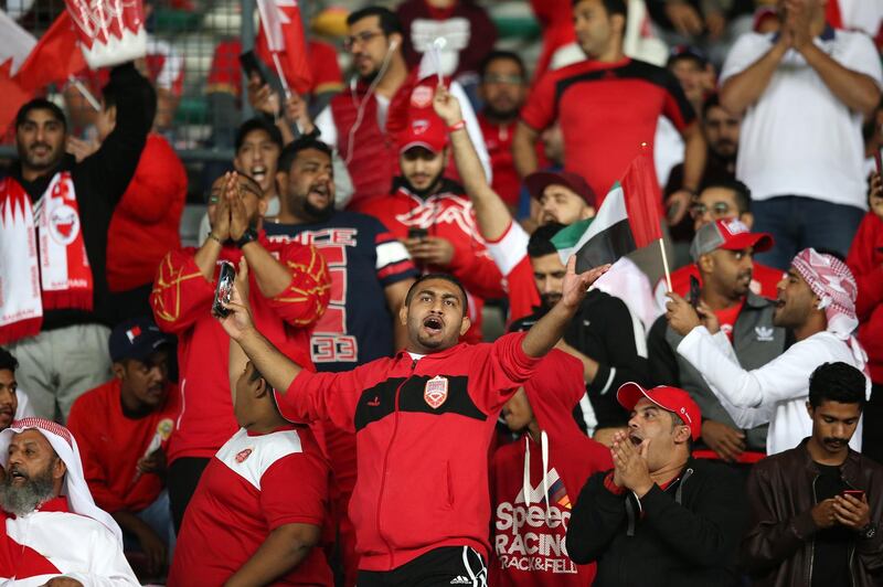 Bahrain fans attend the preliminary round match between UAE and Bahrain. EPA