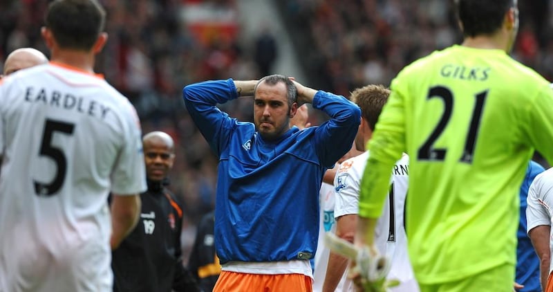 Gary Taylor-Fletcher, then the Blackpool striker, reacts on the day of their relegation in 2011 after a loss to Manchester United.