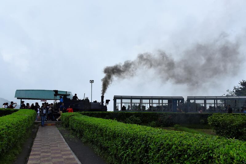 A Darjeeling Himalayan Railway steam train prepares to leave Batasia Loop.