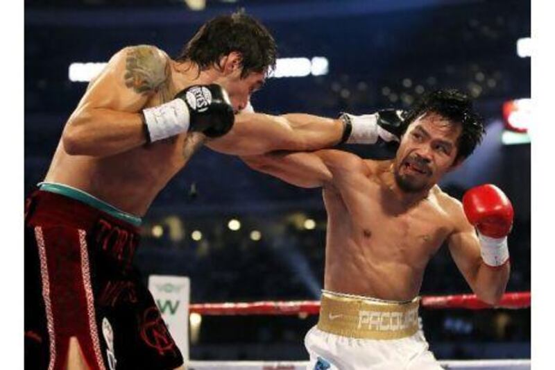 Manny Pacquiao and Antonio Margarito trade punches on the way to Manny's easy victory in 2010. 

MIKE STONE / REUTERS