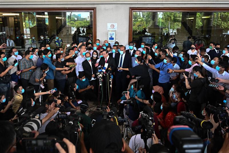 Malaysia's former finance minister Lim Guan Eng speaks to members of the media after posting bail outside the Duta Court Complex in Kuala Lumpur.
AFP