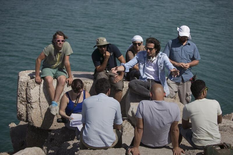 Emirati filmmaker Ali Mostafa works with the crew and actors. Silvia Razgova / The National