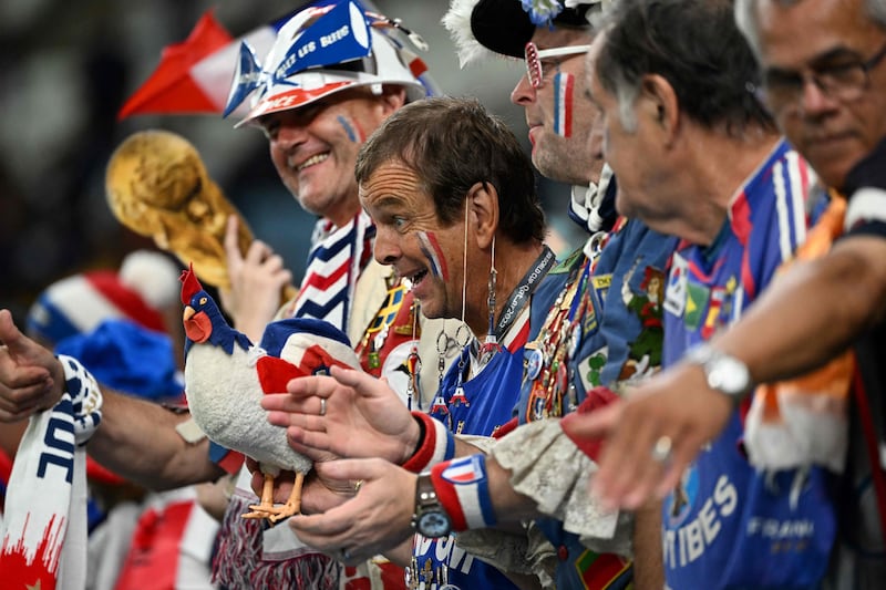 France supporters cheers ahead of the Qatar 2022 World Cup Group D football match between France and Australia. AFP