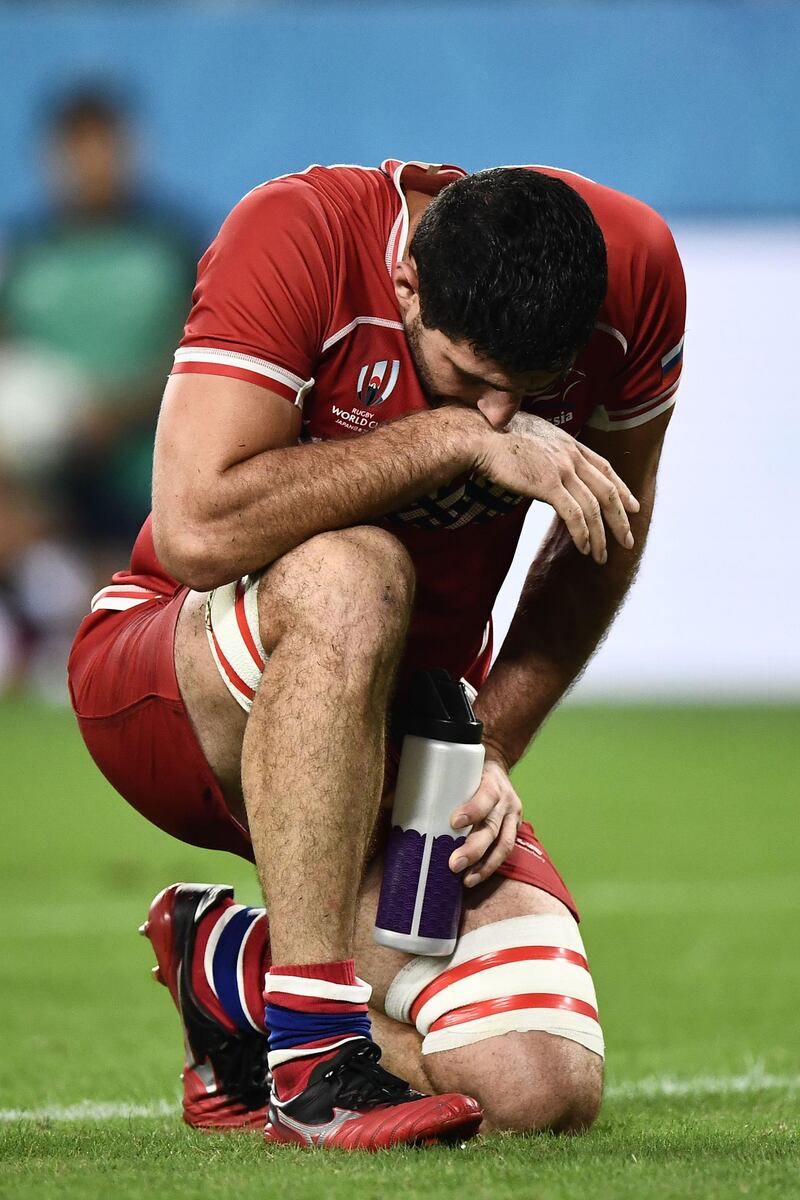 Russia's flanker Tagir Gadzhiev reacts after losing  during the Japan 2019 Rugby World Cup Pool A match between Scotland and Russia at the Shizuoka Stadium Ecopa in Shizuoka. AFP