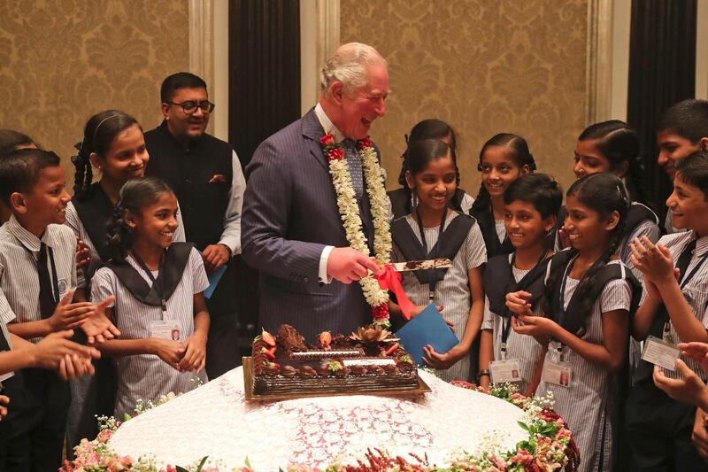 Prince Charles celebrates his birthday with schoolchildren at the Taj Mahal Palace hotel in Mumbai on November 14, 2019. AP