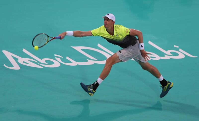 South Africa's Kevin Anderson returns the ball to Austria's Dominic Thiem during the second day of the Mubadala World Tennis Championship in Abu Dhabi, United Arab Emirates, Friday, Dec. 29, 2017. (AP Photo/Kamran Jebreili)