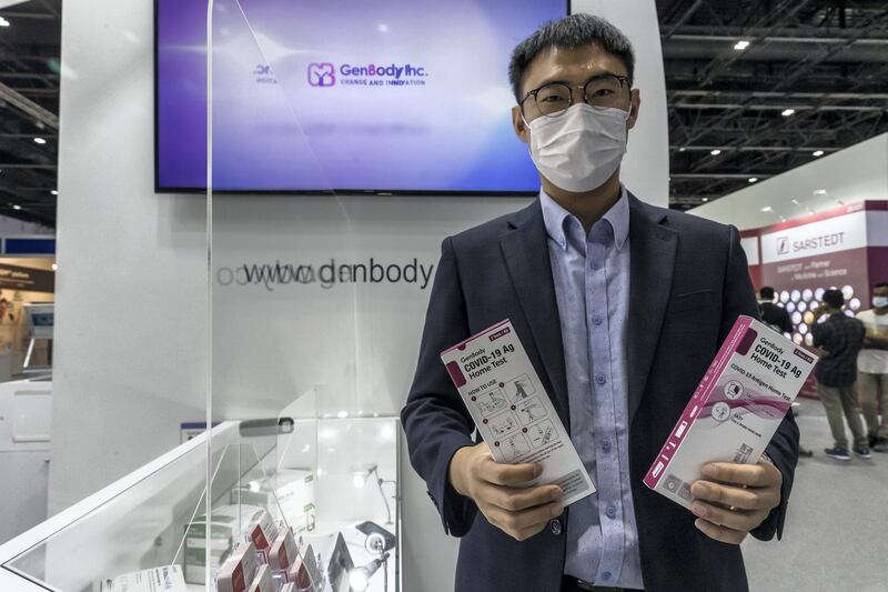The opening day of Arab Health 2021 at the Dubai World Trade Center on June 21st, 2021. 
Steve Lee, Regional Sales Manager of Gen Body Inc from Korea holds one of their Covid-19 home test kits.
Antonie Robertson / The National.
Reporter: Nic Webster for National