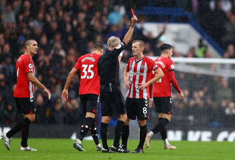 Referee Martin Atkinson shows a red card to James Ward-Prowse of Southampton. Getty