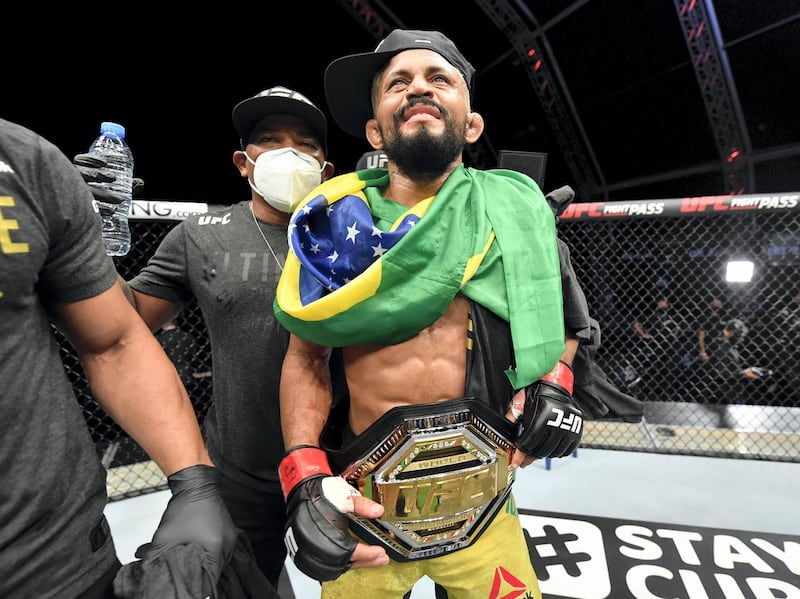 ABU DHABI, UNITED ARAB EMIRATES - JULY 19: Deiveson Figueiredo of Brazil celebrates after defeating Joseph Benavidez in their UFC flyweight championship bout during the UFC Fight Night event inside Flash Forum on UFC Fight Island on July 19, 2020 in Yas Island, Abu Dhabi, United Arab Emirates. (Photo by Jeff Bottari/Zuffa LLC via Getty Images)