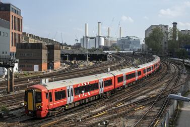 Trains arrive and depart from Victoria Station near Battersea Power Station on April 27, 2020 in London. TfL is seeking a state bailout as its cash reserves have run dry during the coronavirus lockdown. The agency responsible for London's transport network generates 85% of its income through fares. Getty Images