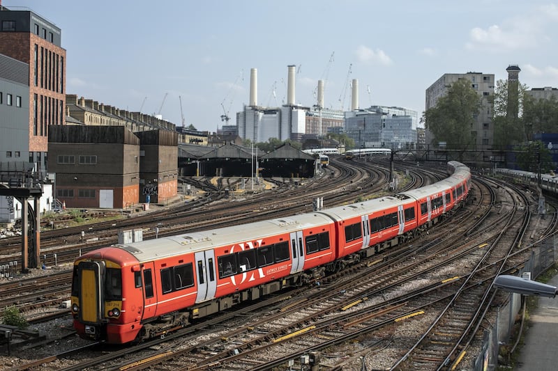 LONDON, ENGLAND - APRIL 27: Trains arrive and depart from Victoria Station near Battersea Power Station on April 27, 2020 in London, England. TfL has announced that it has furloughed 7000 staff as it faces "massive financial challenges" due to the ongoing COVID-19 coronavirus pandemic. British Prime Minister Boris Johnson, who returned to Downing Street this week after recovering from Covid-19, said the country needed to continue its lockdown measures to avoid a second spike in infections. (Photo by Dan Kitwood/Getty Images)