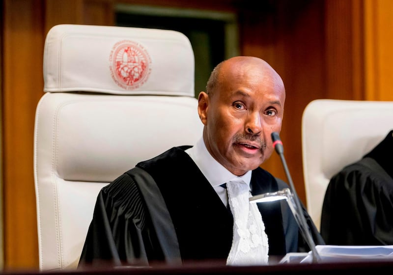 A handout photo released by the International Court of Justice shows International Court of Justice (ICJ) Judge and court president Abdulqawi Ahmed Yusuf speaking during a public hearing in the case concerning the Application of the Convention on the Prevention and Punishment of the Crime of Genocide (The Gambia v. Myanmar) at the Peace Palace in The Hague. AFP