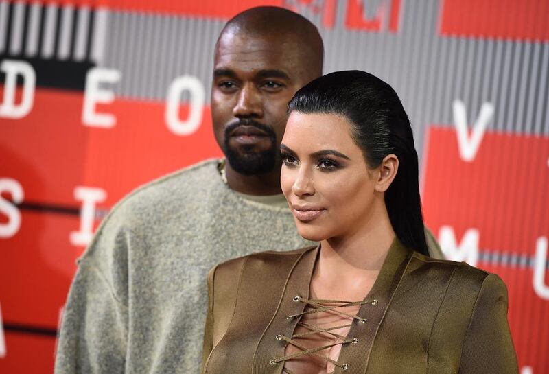 Kanye West, left, and Kim Kardashian arrive at the MTV Video Music Awards at the Microsoft Theater on Sunday, Aug. 30, 2015, in Los Angeles. Jordan Strauss / Invision / AP