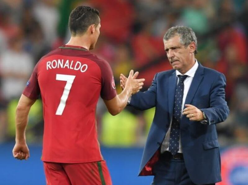 Fernando Santos, right, guided Portugal and Cristiano Ronaldo to the European Championship title in France in the summer, Portugal's first major international title. Peter Powell / EPA 