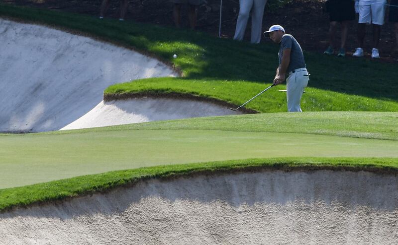 Francesco Molinari of Italy takes a shot during the DP World Tour Championship at Jumeirah Golf Estates in Dubai. AFP