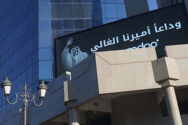 A billboard showing a message of condolences and a picture of Kuwait's late emir Sheikh Nawaf Al Ahmad Al Sabah, is displayed on a building in the centre of Kuwait City. AFP