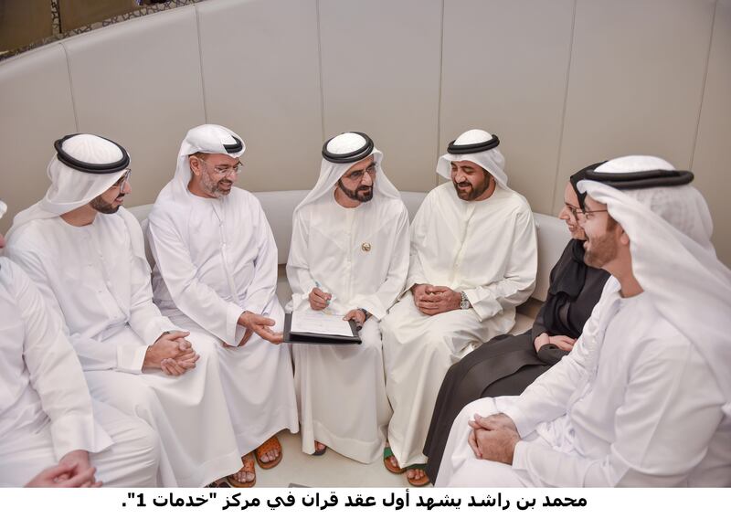 Sheikh Mohammed bin Rashid, Vice President, Prime Minister and Ruler of Dubai, and Mohammed Al Gergawi, Minister of Cabinet Affairs and the Future, witness the first marriage contract performed at the Service 1 centre which opened on Saturday. Wam