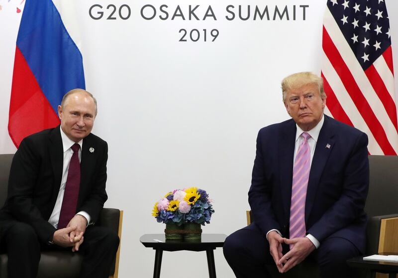 epa07753055 (FILE) - Russian President Vladimir Putin (L) and US President Donald J. Trump (R) meet on the sidelines of the G20 summit in Osaka, Japan, 28 June 2019 (reissued 02 August 2019). US formally withdraws from INF nuclear treaty with Russia on 02 August 2019.  EPA/MICHAEL KLIMENTYEV/SPUTNIK/KREMLIN / POOL MANDATORY CREDIT