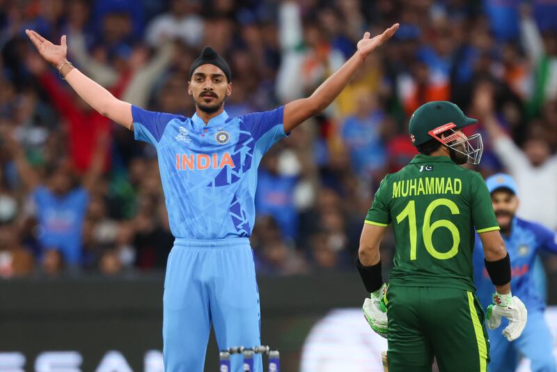 India's Arshdeep Singh, left, reacts after dismissing Pakistan's Mohammad Rizwan. AP