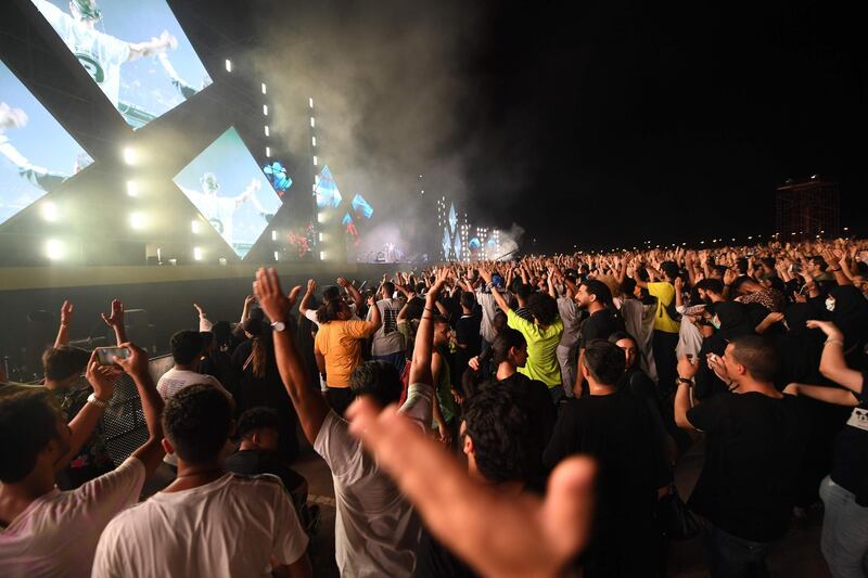 Crowds enjoy Janet Jackson's performance during in Jeddah. / AFP / Amer HILABI
