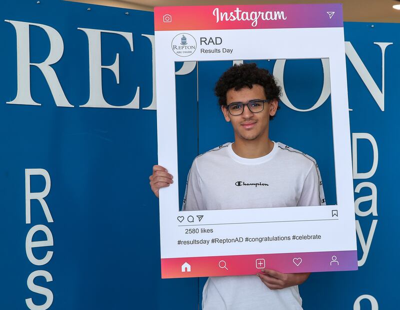 Haroun Ouali celebrates after seeing his A-level grades at Repton School in Abu Dhabi