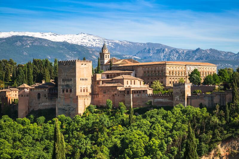 The famous Alhambra palace, Granada, Spain. Alhambra comes from 'Al Hamra', the Arabic word for 'Red One' after the colours of its walls. Getty Images