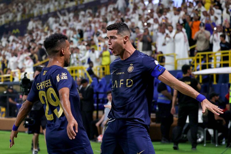 Cristiano Ronaldo celebrates scoring his second goal for Al Nassr against Al Shabab during the Saudi Pro League game at Mrsool Park in Riyadh on August 29, 2023. AFP