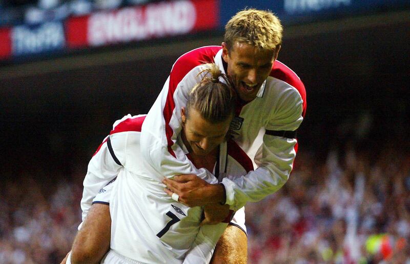 England captain David Beckham is congratulated by Phil Neville after scoring England's opening goal against Croatia in 2003. PA