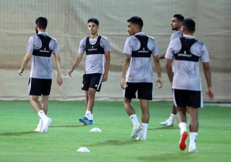 Dubai, United Arab Emirates - October 07, 2019: The UAE's Ali Saleh (M) trains. The UAE football team trains before their upcoming fixture Indonesia. Monday the 7th of October 2019. Al Wasl Sports Club, Dubai. Chris Whiteoak / The National