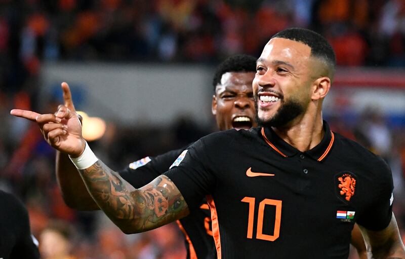 Netherlands' Memphis Depay celebrates scoring the decisive goal in the 3-2 Nations League victory against Wales in Rotterdam on June 14, 2022.  Reuters