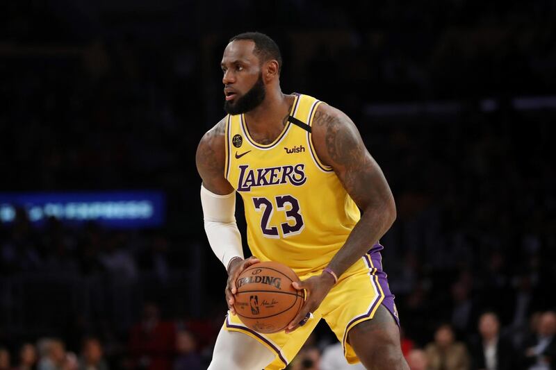 LOS ANGELES, CALIFORNIA - MARCH 03: LeBron James #23 of the Los Angeles Lakers handles the ball in a game against the Philadelphia 76ers during the second half at Staples Center on March 03, 2020 in Los Angeles, California. NOTE TO USER: User expressly acknowledges and agrees that, by downloading and or using this Photograph, user is consenting to the terms and conditions of the Getty Images License Agreement.   Katelyn Mulcahy/Getty Images/AFP