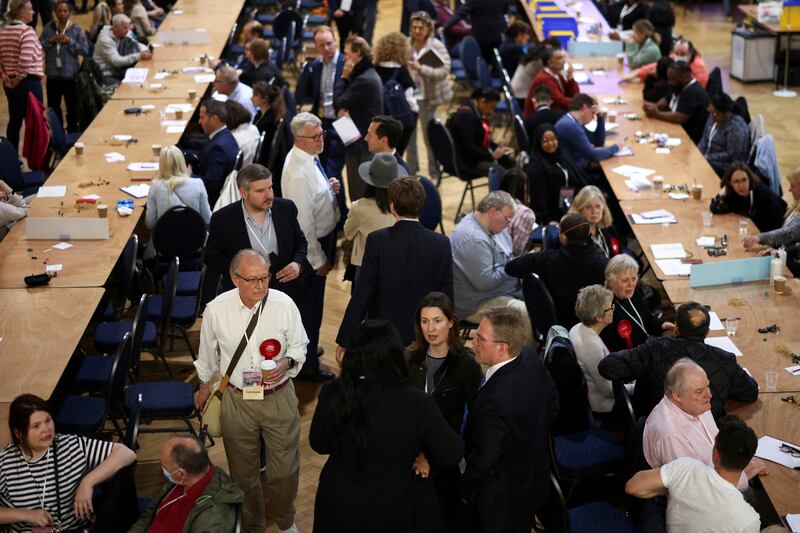 Candidates and observers monitor the counting process at Lindley Hall in Westminster. Reuters