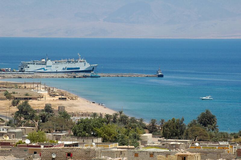 A ferry boat anchors in the bay of Nuweibaa in Egypt's Sinai Peninsula, near to where the latest fatal road accident took place. Alamy