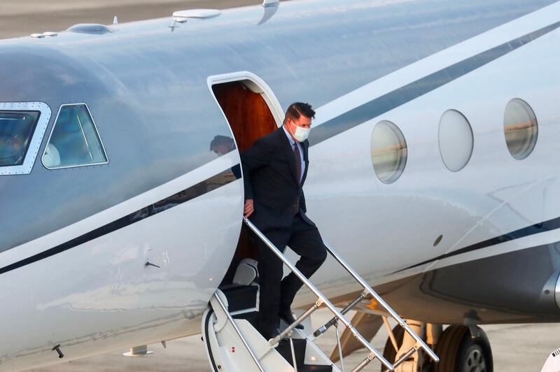 Keith Krach, US Undersecretary of State for Economic Growth, Energy and the Environment, alights from an aircraft after landing at the Sungshan airport in Taipei on September 17, 2020.   A top US diplomat landed in Taiwan on September 17, the highest-ranking State Department official to visit in 40 years, in a further sign of Washington's willingness to defy China and its campaign to isolate the self-ruled island. / AFP / POOL / Pei Chen
