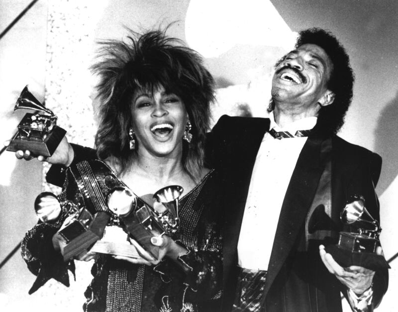 Turner and Lionel Richie pose with a total of five awards between them at the Grammy Awards in Los Angeles in 1985. AP