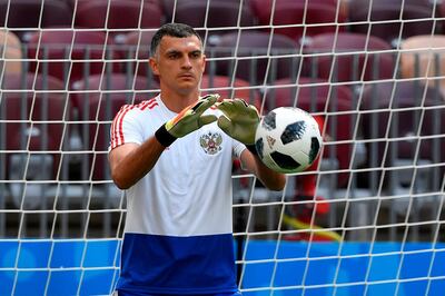 Russia's goalkeeper Vladimir Gabulov takes part in a training session at the Luzhniki Stadium in Moscow on June 13, 2018 ahead of the Russia 2018 World Cup opening football match between Russia and Saudi Arabia. / AFP / Alexander NEMENOV
