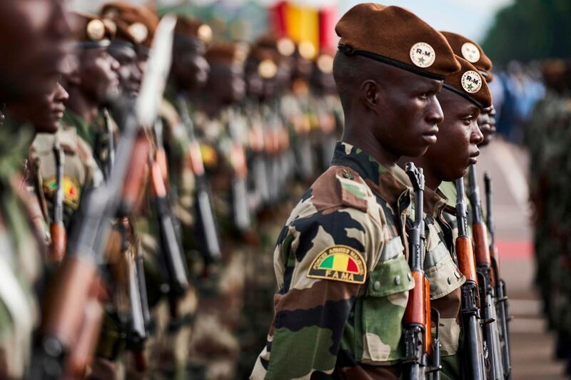 (FILES) In this file photo taken on September 22, 2018 Malian soldiers take part in celebrations marking Mali's 58th anniversary of independence in Bamako. Fifty-three soldiers were killed on November 1, 2019, in a "terrorist attack" on a Mali military post in the northeast of the country.
The assault is one of the deadliest strikes against Mali's military in recent Islamist militant violence. / AFP / Michele CATTANI
