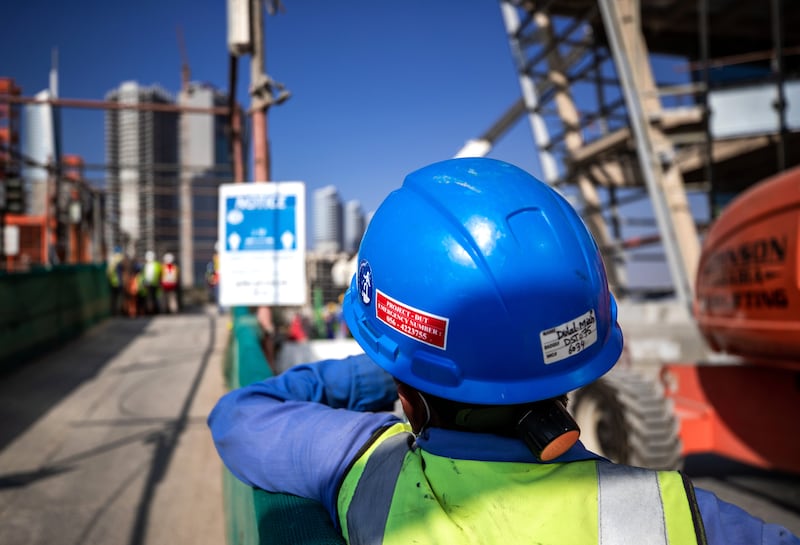 A close-up of a construction worker on the Uptown Tower site.