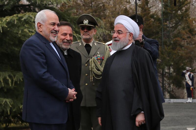 epa07401033 A handout photo made available by the presidential office shows Iranian Foreign Minister Mohammad Javad Zarif (L) talking to President Hassan Rouhani during a welcoming ceremony for Armenian Prime Minister Nikol Pahinyan (unseen), in Tehran, Iran, 27 February 2019. President Rouhani on 27 February officially rejected the resignation of Zarif, saying it would not benefit the Islamic Republic. Iran's top diplomat, in office since August 2013, announced his surprise resignation on 25 February, without specifying the reasons behind his decision.  EPA/PRESIDENTIAL OFFICE HANDOUT  HANDOUT EDITORIAL USE ONLY/NO SALES