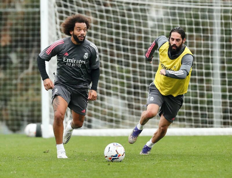 MADRID, SPAIN - NOVEMBER 18: Marcelo and Isco in action at Valdebebas training ground on November 18, 2020 in Madrid, Spain. (Photo by Helios de la Rubia/Real Madrid via Getty Images)