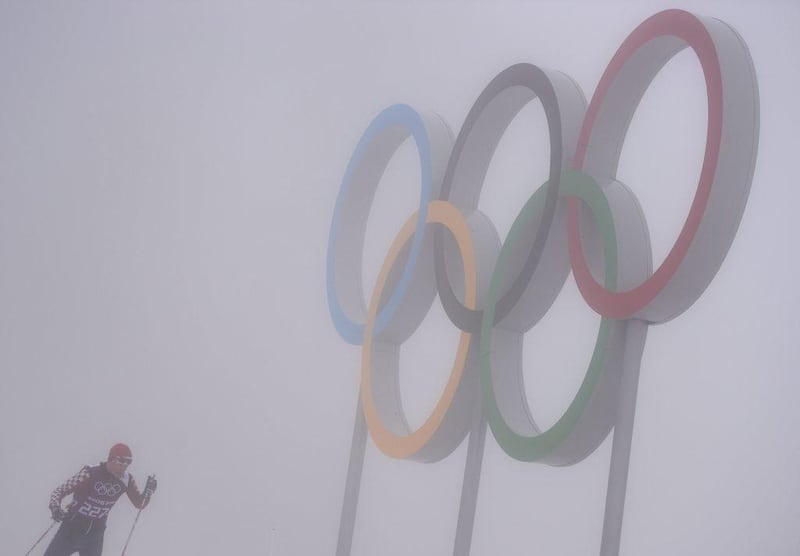 An athlete during his training session in heavy fog at the Laura Cross Country Skiing Center at the 2014 Winter Olympics in Krasnaya Polyana on Monday. Hendrik Schmidt / EPA  