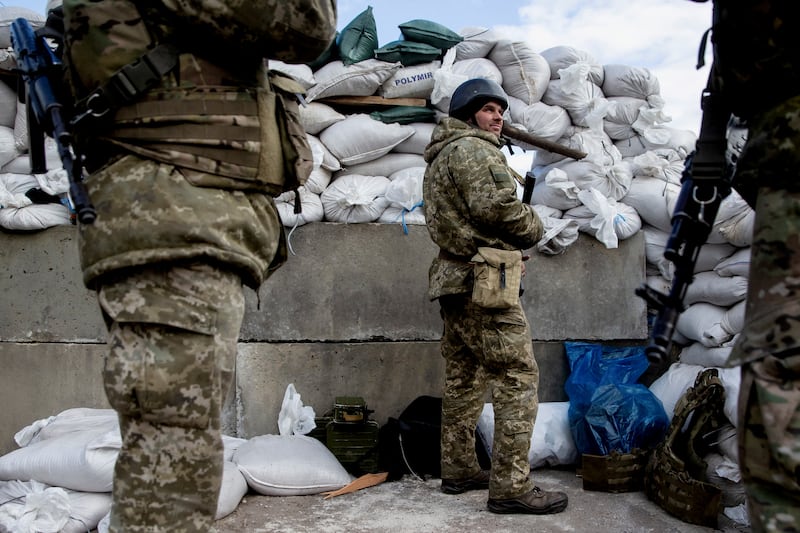 Ukrainian soldiers at a check point in the city of Zhytomyr. Reuters