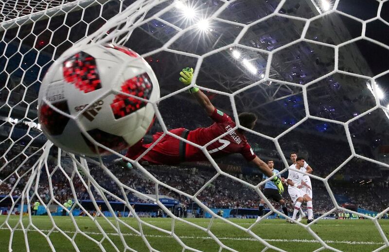 Soccer Football - World Cup - Round of 16 - Uruguay vs Portugal - Fisht Stadium, Sochi, Russia - June 30, 2018   Portugal's Pepe scores their first goal    REUTERS/Henry Romero     TPX IMAGES OF THE DAY