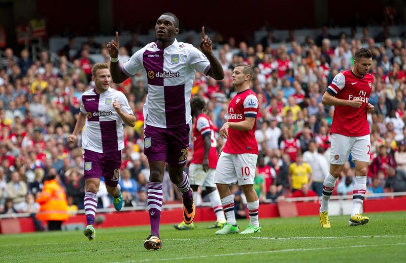 LONDON, ENGLAND - AUGUST 17: Christian Benteke of Aston Villa celebrates his second goal of the game for Aston Villa during the Barclays Premier League match between Arsenal and Aston Villa at Emirates Stadium on August 17, 2013 in London, England. (Photo by Neville Williams/Aston Villa FC via Getty Images)